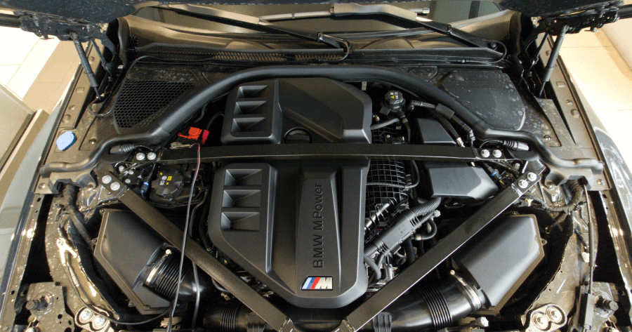 BMW M Power engine bay with visible V8 engine cover badging