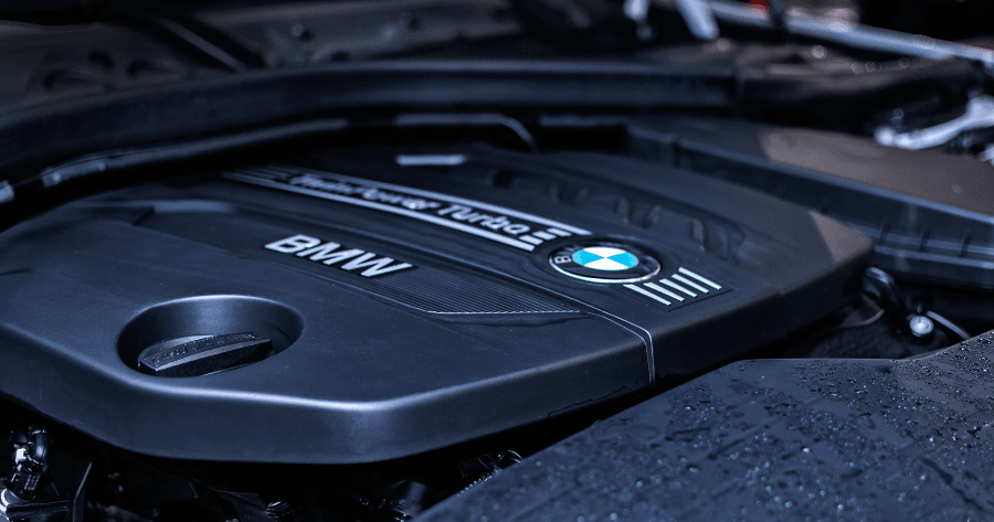 BMW diesel engine cover with twin turbo badge close-up